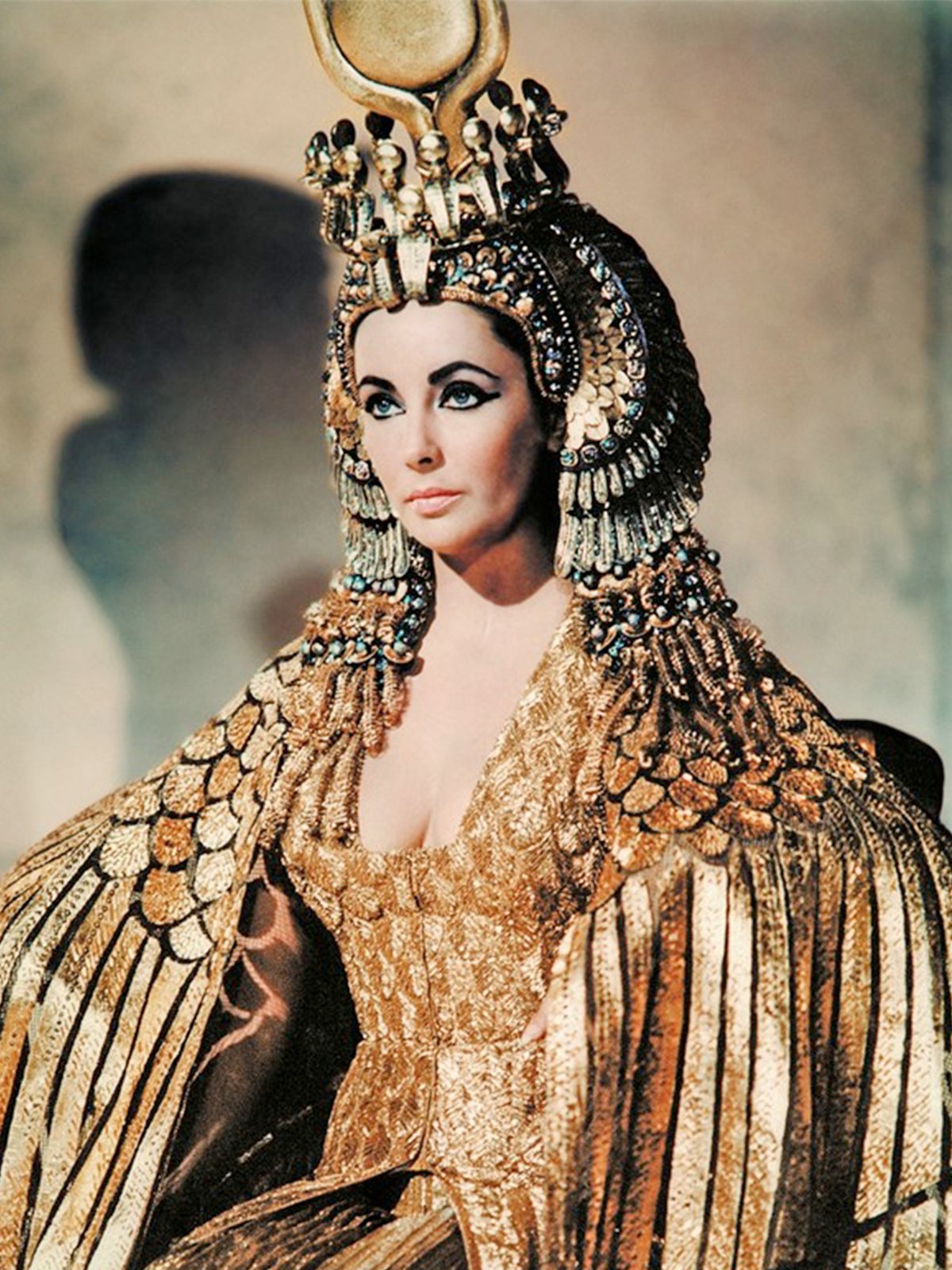 A regal and sumptuous gold gown for diva Liz Taylor 